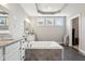 This is a relaxing bathroom, with a large tub, recessed lighting, and granite counters at 14747 Harvest Glen S Blvd, Fishers, IN 46037