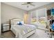 Bedroom with a bed, window view, and dedicated desk space at 14747 Harvest Glen S Blvd, Fishers, IN 46037