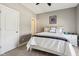 Bedroom with modern bed, closet, and soft neutral tones at 14747 Harvest Glen S Blvd, Fishers, IN 46037