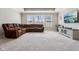 Large living room with natural light and ample space for entertaining at 14747 Harvest Glen S Blvd, Fishers, IN 46037