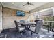Relaxing screened patio with outdoor seating and string lights, perfect for entertaining and relaxing at 14747 Harvest Glen S Blvd, Fishers, IN 46037