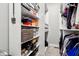 This walk-in closet features shelves, hanging rods and is well lit at 14747 Harvest Glen S Blvd, Fishers, IN 46037