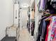 This walk-in closet has ample storage and is well lit at 14747 Harvest Glen S Blvd, Fishers, IN 46037