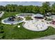 Aerial view of community playground with splashpad and play structures at 1537 Carrollton Ave, Indianapolis, IN 46202