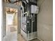 Basement mechanicals feature a Goodman furnace and humidifier at 1537 Carrollton Ave, Indianapolis, IN 46202