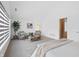 Bedroom boasts an inviting sitting area with stylish chairs and ample natural light at 1537 Carrollton Ave, Indianapolis, IN 46202
