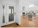Grand foyer with a clear view into the spacious living room featuring modern furnishings and a cozy fireplace at 1537 Carrollton Ave, Indianapolis, IN 46202