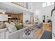 Expansive open-concept living space connects the kitchen and dining areas, perfect for modern living and entertaining at 1537 Carrollton Ave, Indianapolis, IN 46202