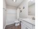 Clean bathroom with white subway tiles in the shower and decorative butterfly decals at 1695 Jackson St, Fortville, IN 46040