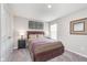 Bedroom with carpet, a queen sized bed, and two nightstands at 1695 Jackson St, Fortville, IN 46040