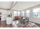 Bright dining area featuring hardwood floors, natural light, and table with seating at 1695 Jackson St, Fortville, IN 46040