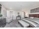 Main bedroom featuring plush carpeting, an accent chair, and ensuite bath at 1695 Jackson St, Fortville, IN 46040