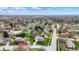 Charming suburban neighborhood featuring well-maintained homes and green spaces under a blue sky with scattered clouds at 1716 Teakwood Ct, Lafayette, IN 47905