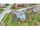From above, this residence boasts a well-manicured yard with charming patio area, nestled in a quiet residential area at 1716 Teakwood Ct, Lafayette, IN 47905