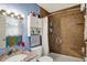 Full bathroom with tiled shower and granite vanity at 1716 Teakwood Ct, Lafayette, IN 47905