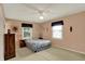Bright and airy bedroom with large windows and neutral colors at 1716 Teakwood Ct, Lafayette, IN 47905