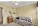 Bedroom with floral sofa and side table, creating a cozy and inviting living space at 1716 Teakwood Ct, Lafayette, IN 47905