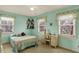 Charming bedroom featuring a bed, desk, and lots of natural light at 1716 Teakwood Ct, Lafayette, IN 47905