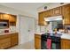 Bright kitchen with a white pantry door and modern appliances at 1716 Teakwood Ct, Lafayette, IN 47905