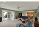 Cozy living room with patio access and open view to kitchen at 1716 Teakwood Ct, Lafayette, IN 47905