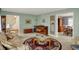 Comfortable living room with views into the foyer and dining room areas at 1716 Teakwood Ct, Lafayette, IN 47905
