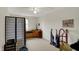 Neutral carpeted Living Room with natural light, ceiling fan, and storage at 1716 Teakwood Ct, Lafayette, IN 47905