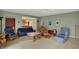 Inviting living room with carpet and comfortable furniture arrangement at 1716 Teakwood Ct, Lafayette, IN 47905