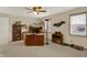 Large home office with multiple bookshelves and a desk, providing ample storage and workspace at 1716 Teakwood Ct, Lafayette, IN 47905