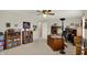 Office with multiple bookshelves and a large desk, providing a dedicated workspace at 1716 Teakwood Ct, Lafayette, IN 47905