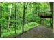 Home's exterior features an elevated deck accessible from the backyard at 2143 Sunderland Dr, Martinsville, IN 46151