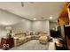 Comfortable basement living area with plush seating and built-in shelving at 2143 Sunderland Dr, Martinsville, IN 46151