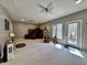 Finished basement area with carpet flooring, walkout access, and natural light at 2143 Sunderland Dr, Martinsville, IN 46151