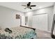Neutral bedroom with a ceiling fan, closet, and carpeted floor at 2143 Sunderland Dr, Martinsville, IN 46151