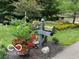 Beautiful yard with creative landscaping details, including a decorative mailbox at 2143 Sunderland Dr, Martinsville, IN 46151