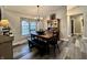 Comfortable dining room with natural lighting and a spacious table for gatherings and Gathering meals at 2143 Sunderland Dr, Martinsville, IN 46151