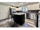 Bright kitchen with granite countertops, stainless steel appliances, kitchen island and modern finishes at 2143 Sunderland Dr, Martinsville, IN 46151