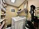 Convenient laundry room with modern appliances and ample shelving for storage at 2143 Sunderland Dr, Martinsville, IN 46151