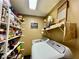 Functional laundry room featuring shelving and a washing machine at 2143 Sunderland Dr, Martinsville, IN 46151