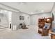 Comfortable living room featuring neutral walls, ceiling fans, and a carpet at 2143 Sunderland Dr, Martinsville, IN 46151