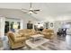 Spacious living room with vaulted ceiling, modern flooring, and cozy furniture at 2143 Sunderland Dr, Martinsville, IN 46151