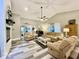 Cozy living room with a fireplace, comfortable seating, and neutral tones at 2143 Sunderland Dr, Martinsville, IN 46151