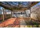 Beautiful backyard with brick patio and charming pergola, offering a serene outdoor space at 2309 Pearl St, Columbus, IN 47201