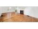 Cozy living room with fireplace and hardwood floors, perfect for entertaining and relaxing at 2309 Pearl St, Columbus, IN 47201