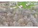 Overview of the property, showcasing its wooded areas and surrounding neighborhood at 2420 Goose Creek Rd, Martinsville, IN 46151