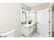 Bright bathroom with a double sink vanity, modern lighting, and sleek black fixtures at 2420 Goose Creek Rd, Martinsville, IN 46151