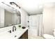 Modern bathroom with stylish vanity, sleek fixtures, and a tub-shower combo at 2420 Goose Creek Rd, Martinsville, IN 46151
