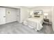 Carpeted basement bedroom with neutral walls, comfortable bed, and ample lighting at 2420 Goose Creek Rd, Martinsville, IN 46151