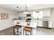 Stylish kitchen with white cabinets, stainless steel appliances, and an island at 2420 Goose Creek Rd, Martinsville, IN 46151