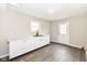 Laundry room area with white cabinets and sink next to an exterior door at 2420 Goose Creek Rd, Martinsville, IN 46151