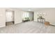Open-concept living area with ample natural light and cozy furnishings at 2420 Goose Creek Rd, Martinsville, IN 46151